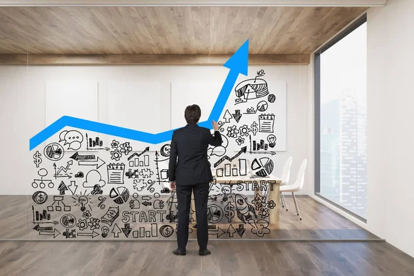 Businessman drawing graph on glassboard — Stock Photo, Image