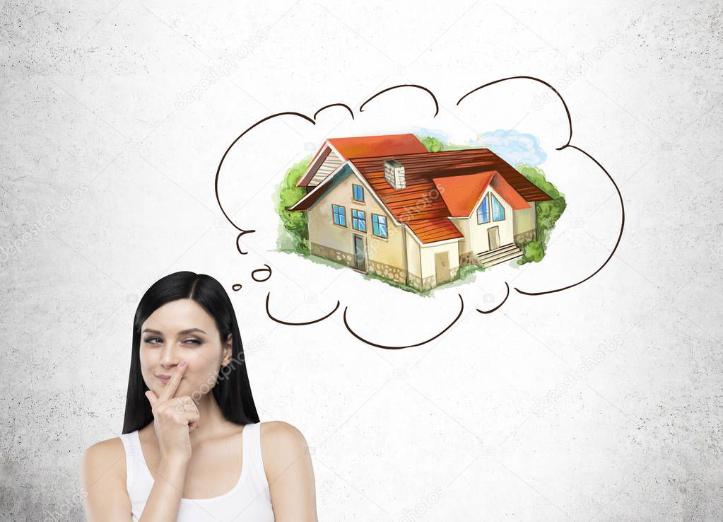 Woman with black hair is dreaming about a new house