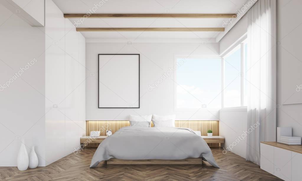 Vooraanzicht van de slaapkamer met zitbank en ingelijste poster ... Vooraanzicht van de slaapkamer met zitbank en ingelijste poster ...