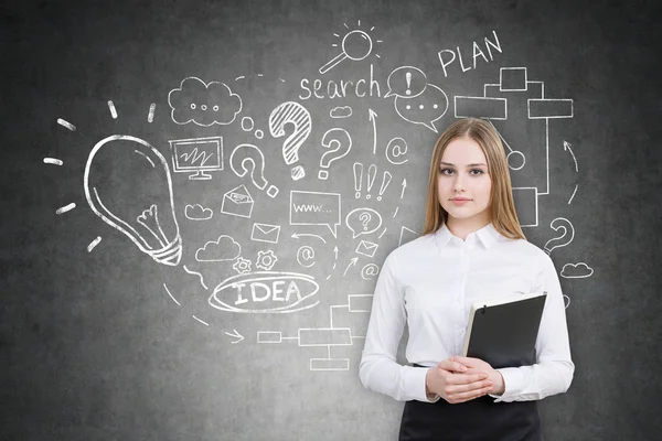 Serious girl with black folder and startup idea sketch — Stock Photo, Image