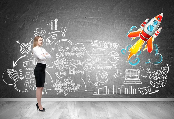 Blond woman looking at rocket and startup icons — Stock Photo, Image