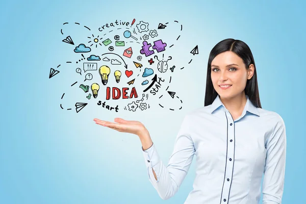 Woman is holding business idea sketch — Stock Photo, Image