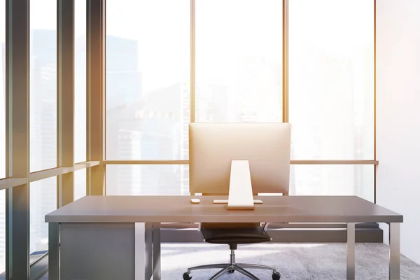 Close up of a desktop in panoramic window room, toned — Stock Photo, Image
