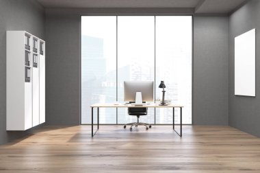 CEO office kitap rafı, bilgisayar ve poster