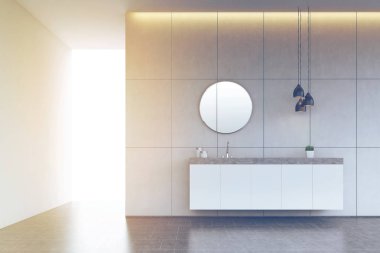 Banyo lavabo yuvarlak ayna ile döşenmiş duvar, beton zemin, t