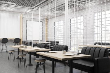 Bir kafe iç rendeleyin ve siyah kanepe ile yan görünüm