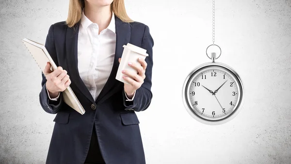 Close up of businesswoman with coffee and notebook and a large s — Stock Photo, Image