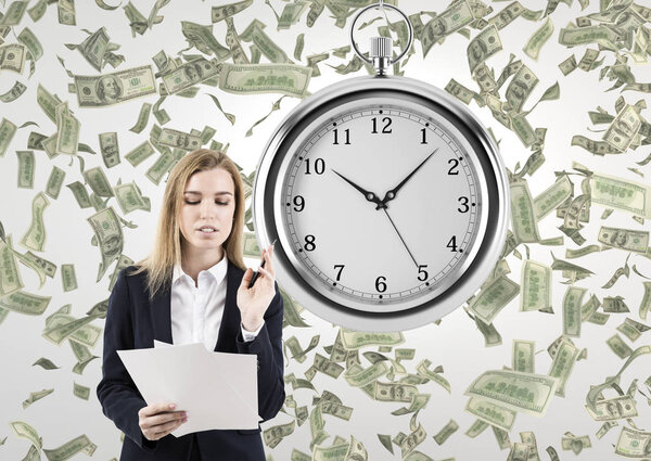 Woman with documents in a room with a stopwatch and dollars