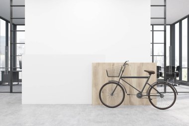 Bisiklet beyaz duvarlı bir ofiste