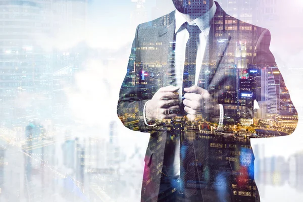 Close up of a bearded businessman in a city with night city in t — Stock Photo, Image