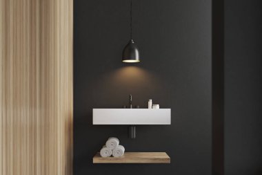 Bir lavabo bir raf havlu ile kapatın