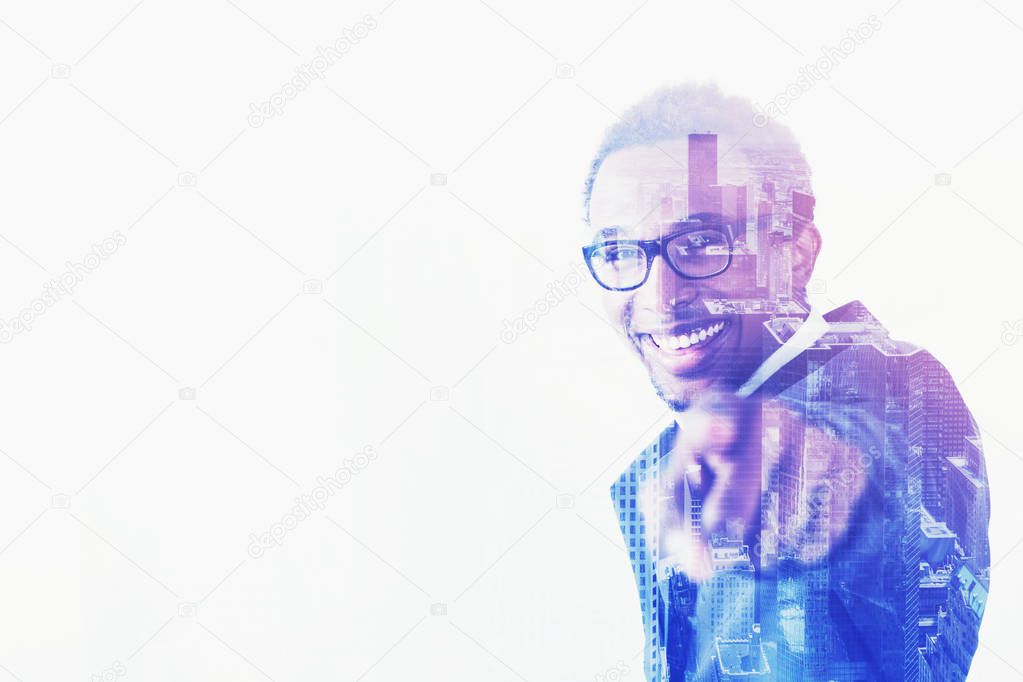 Bespectacled African American businessman pointing at you, smile