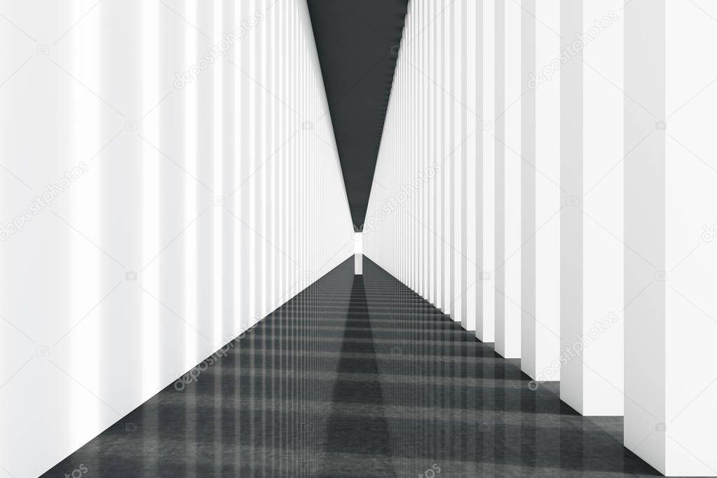 Long corridor with white columns and black floor