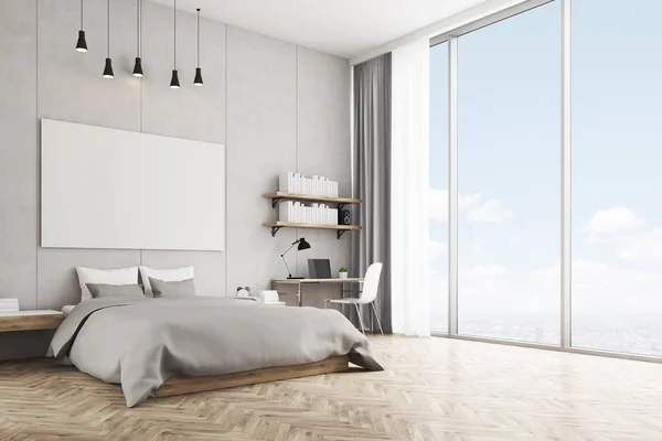 Спальня с бетонной стеной и деревянным полом — стоковое фото