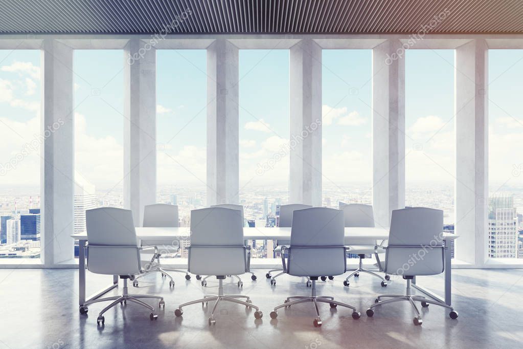 Conference room with wide shades on window. City