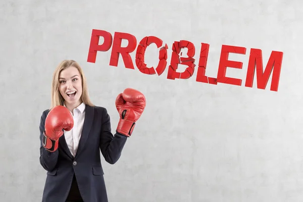Boxer businesswoman solving problems — Stock Photo, Image
