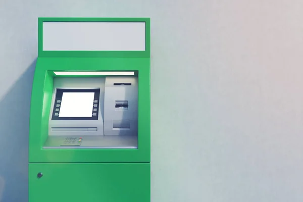 Закрыть зеленый банкомат — стоковое фото