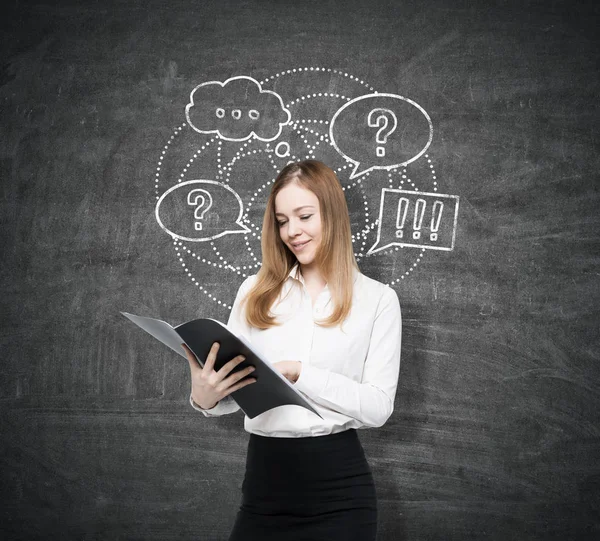 Woman with folder, answer sketch on chalkboard — Stock Photo, Image