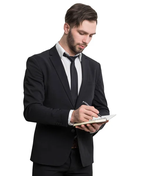 Empresário barbudo escrevendo em caderno, isolado — Fotografia de Stock