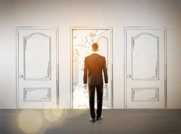 Businessman entering a drawn door — Stock Photo, Image