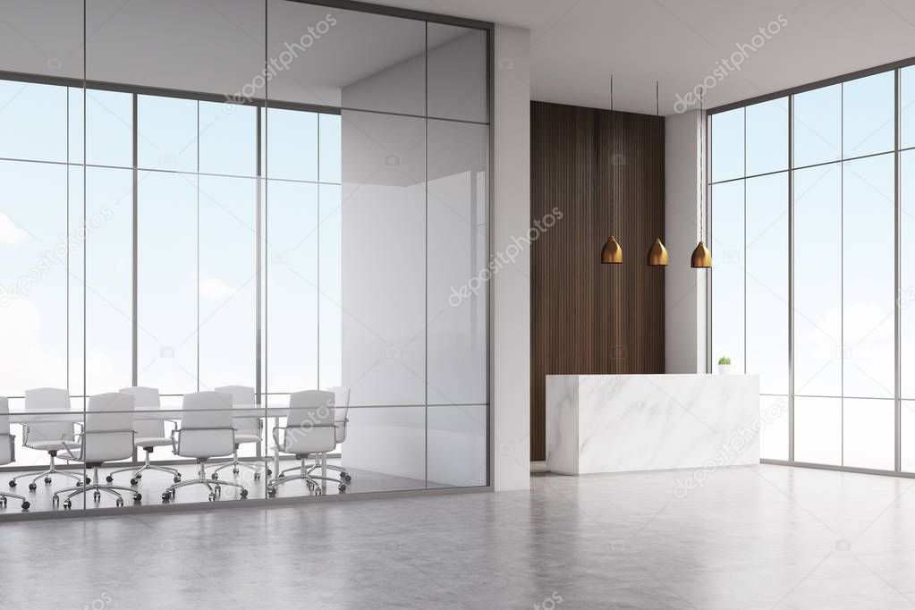 Corner of office, white reception, dark wood, lamps