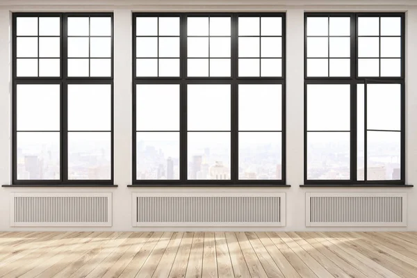 Leerer Raum mit großen Fenstern und Holzboden — Stockfoto