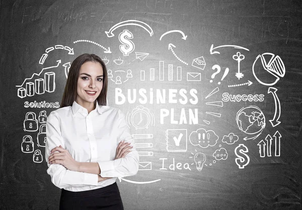 Woman with crossed arms, business plan — Stock Photo, Image