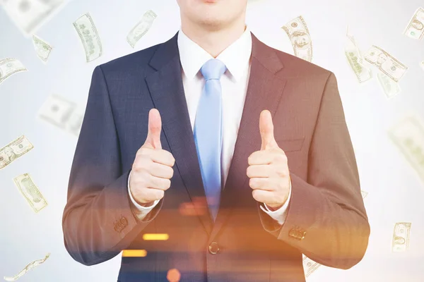 Thumbs up man in dollar rain, toned — Stock Photo, Image