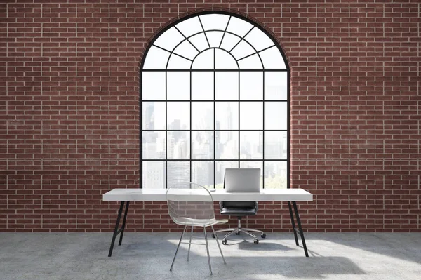 Home office with brick walls