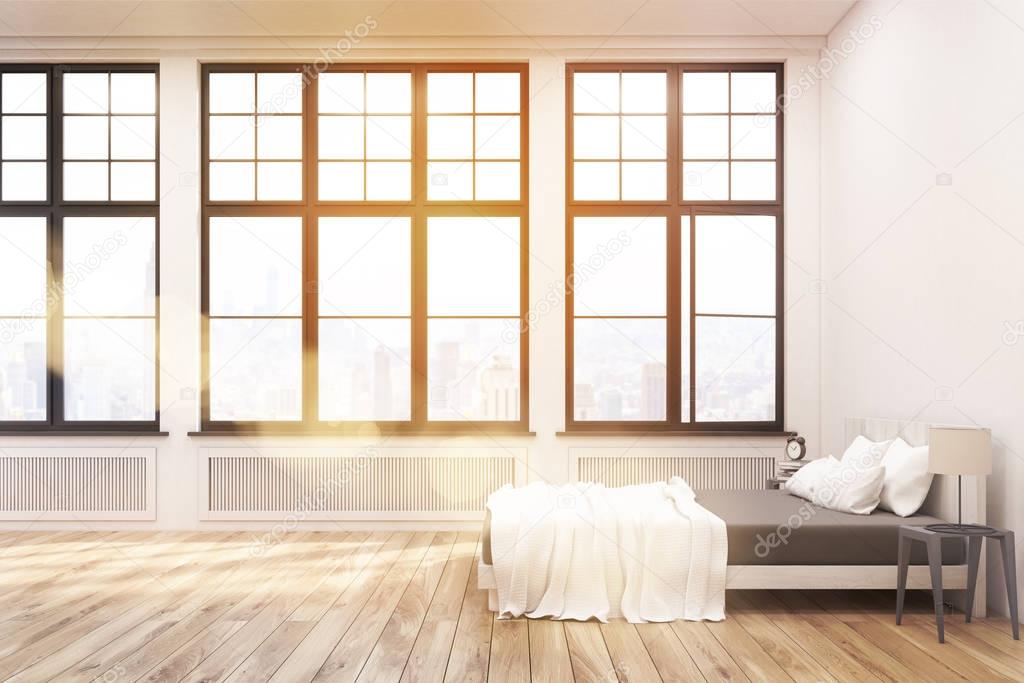 Side view of bedroom with big windows, toned