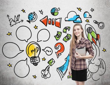 Tablet ve renkli başlangıç simgeleri ile kız