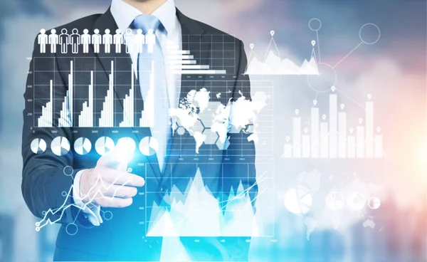 Geschäftsmann zeigt auf High-Tech-Panel mit Geschäftsdiagrammen und Diagrammen. Modernisierungskonzept — Stockfoto