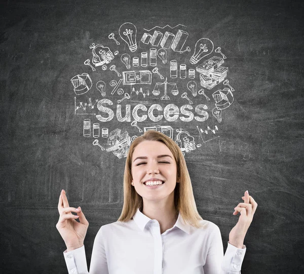 Woman with crossed fingers and success — Stock Photo, Image