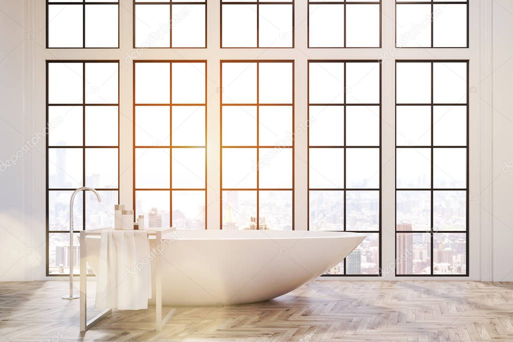 Bathroom interior with a white bathtub of original shape and a towel rack. There are big windows with cityscape. 3d rendering. Toned image