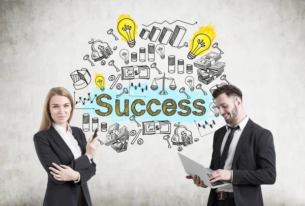 Man and woman with success sketch — Stock Photo, Image