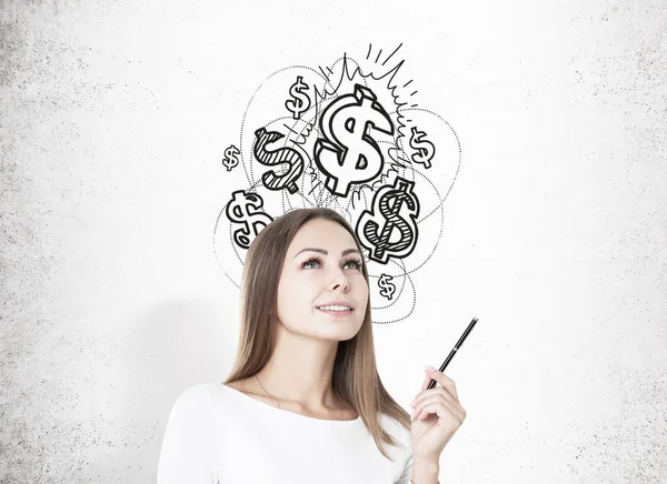 Mujer con bolígrafo y signos de dólar brillante —  Fotos de Stock