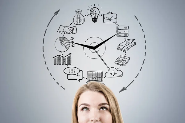 Close up of woman head and business clock — Stock Photo, Image