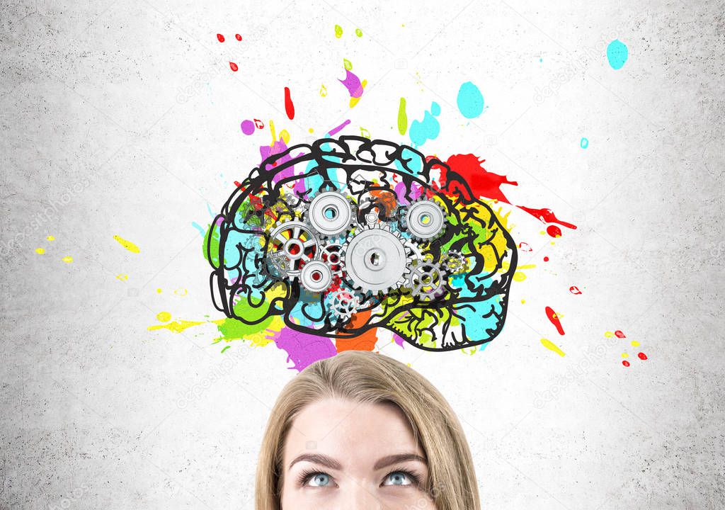 Close up of woman head with brain and cogs