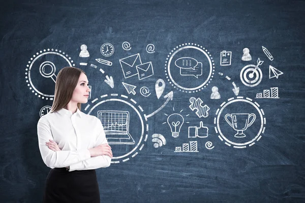 Serious businesswoman and business prize, blackboard — Stock Photo, Image