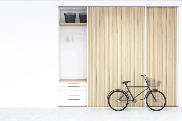 Built in wadrobe in a room with bike — Stock Photo, Image