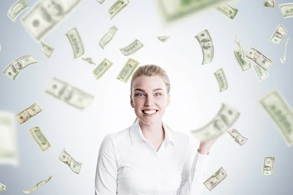 Happy blond woman and dollar rain — Stock Photo, Image