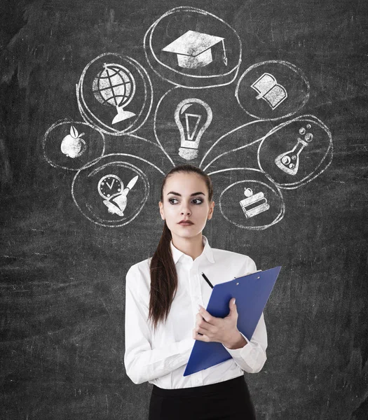Woman with clipboard and education choice — Stock Photo, Image