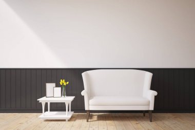 Siyah ve beyaz bir odada beyaz kanepe