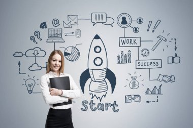 Klasör ve roket gri kadın ile