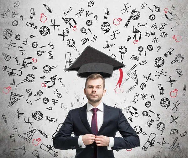 Confident businessman and education icons — Stock Photo, Image