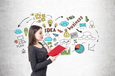 Bir kitap ve renkli iş fikri ile kız