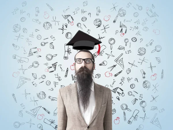 Man with long beard and education icons — Stock Photo, Image