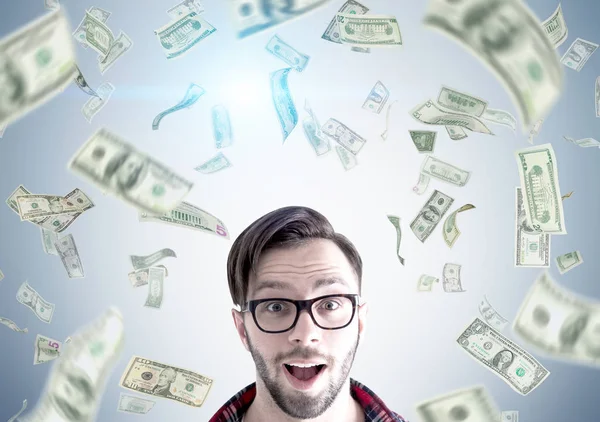 Hipster guy under dollar rain — Stock Photo, Image