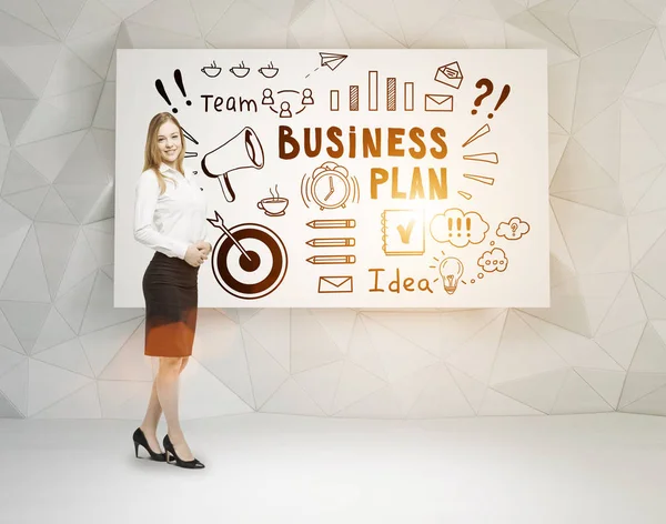 Blond woman and business plan poster — Stock Photo, Image