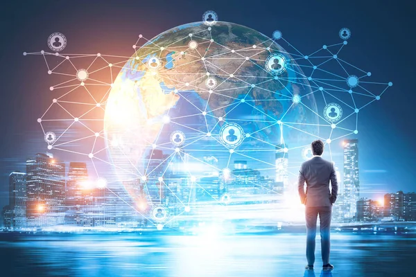 Man looking at Earth and network — Stock Photo, Image